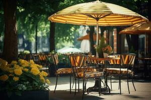 cafeteria mesa com cadeira e sombrinha guarda-chuva dentro a jardim foto