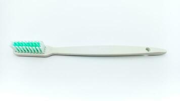 branco plástico escova de dente isolado em branco fundo foto