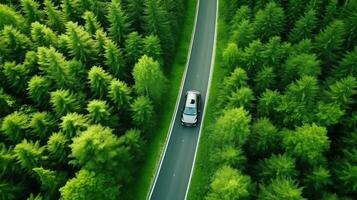 aéreo Visão do elétrico carro e ev elétrico energia para ambiente, ev carro em floresta estrada. ecossistema ecologia saudável ambiente. generativo ai foto