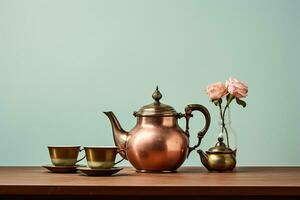 uma natureza-morta fotografia apresentando uma rústico chaleira delicado chá copos e vintage utensílios em uma sereno gradiente fundo foto