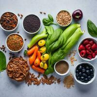 saudável frutas, vegetais, sementes, superalimentos, e cereais em cinzento concreto fundo, ai gerado foto