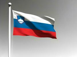 eslovénia nacional bandeira acenando em cinzento fundo foto