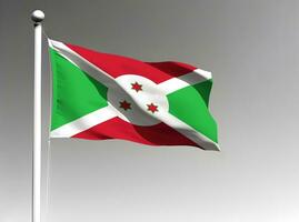 Burundi nacional bandeira acenando em cinzento fundo foto