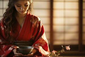 fechar acima Visão do uma japonês mulher dentro uma vermelho quimono sentado estilo seiza, com cerâmico tigela para chá cerimônia. ai gerado. foto