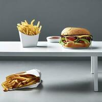 frente Visão refeição branco escrivaninha com francês fritas e sanduíche em a cinzento chão. ai generativo foto