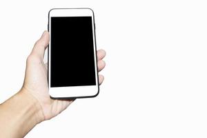 mão segurando um smartphone móvel em fundo branco foto