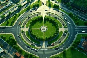 aéreo topo Visão do uma rotunda dentro a meio do uma verde cidade foto