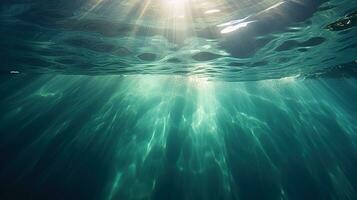 generativo ai, Sombrio azul oceano superfície visto a partir de embaixo da agua com Sol luz foto