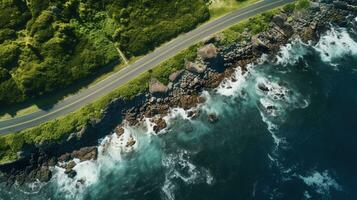 generativo ai, aéreo Visão do curvado asfalto estrada perto a oceano ou mar, litoral foto