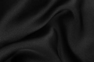 A textura lisa e elegante de seda ou cetim pode ser usada como fundo abstrato. design de fundo luxuoso foto