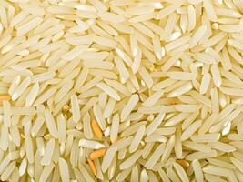 fechar acima cru arroz fundo. macro foto