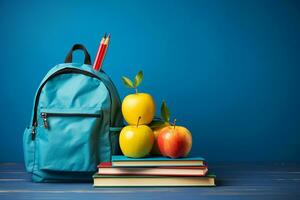 costas para escola Essenciais azul mochila, livros, e maçãs generativo de ai foto