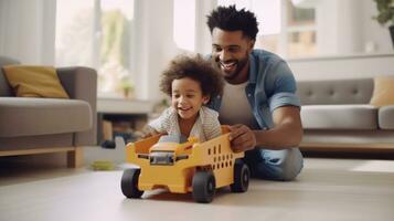 pai e filho estão jogando às casa com fingir carro dentro uma caixa foto