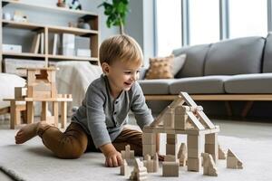 criança jogando com de madeira blocos dentro a família quarto foto