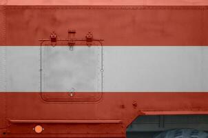 Áustria bandeira retratado em lado parte do militares blindado caminhão fechar-se. exército forças conceptual fundo foto