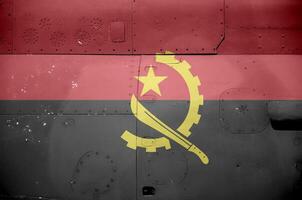 Angola bandeira retratado em lado parte do militares blindado helicóptero fechar-se. exército forças aeronave conceptual fundo foto