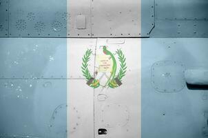 Guatemala bandeira retratado em lado parte do militares blindado helicóptero fechar-se. exército forças aeronave conceptual fundo foto