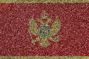 Montenegro bandeira retratado em muitos pequeno brilhante lantejoulas. colorida festival fundo para festa foto