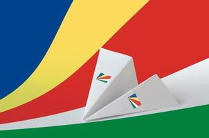 seychelles bandeira retratado em papel origami avião. feito à mão artes conceito foto