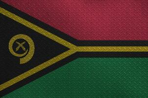 vanuatu bandeira retratado dentro pintura cores em velho escovado metal prato ou parede fechar-se. texturizado bandeira em rude fundo foto