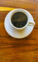 xícara de café preto americano no restaurante méxico. foto