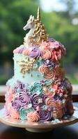caprichoso unicórnio bolo com arco Iris camadas foto