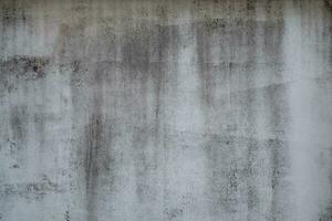 velho muro de concreto na cor preto e branco, parede de cimento, parede quebrada, textura de fundo foto