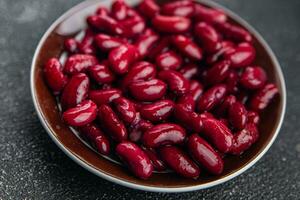 vermelho feijões legumes pronto para comer Aperitivo refeição Comida lanche em a mesa cópia de espaço Comida fundo foto