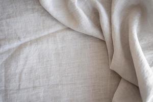 alfaiataria de tecido de pano branco. conceito de foto bonita de alta qualidade