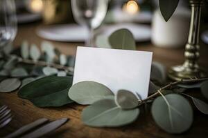 elegante branco nome cartão em uma rústico eucalipto Casamento mesa foto