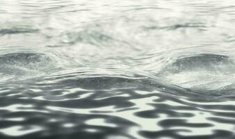 tranquilo água superfície textura com ondulações e salpicos foto