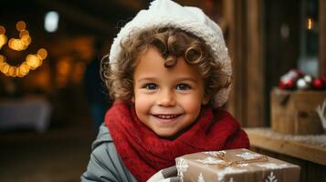 fofa jovem Garoto vestido para uma Nevado Natal segurando uma embrulhado presente. generativo ai. foto