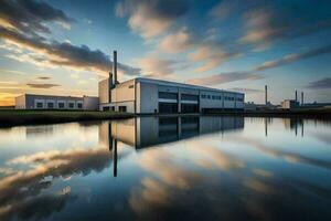 uma fábrica construção com água e nuvens refletido dentro a água. gerado por IA foto