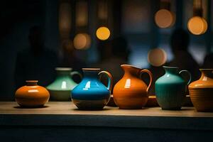 uma linha do colorida vasos em uma mesa. gerado por IA foto