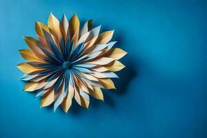 uma azul e ouro origami flor em uma azul muro. gerado por IA foto