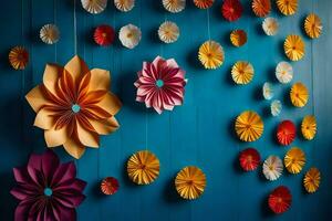 colorida papel flores suspensão a partir de uma azul muro. gerado por IA foto