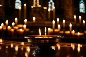 uma vela é aceso dentro frente do uma Igreja com velas. gerado por IA foto