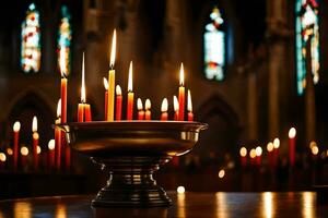 uma ampla tigela com velas dentro frente do uma igreja. gerado por IA foto