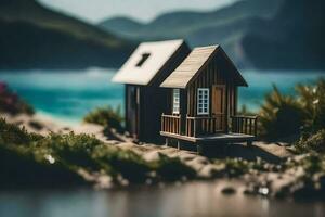 uma miniatura casa em a de praia com montanhas dentro a fundo. gerado por IA foto