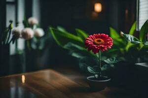 uma vermelho flor senta dentro uma Panela em uma mesa. gerado por IA foto