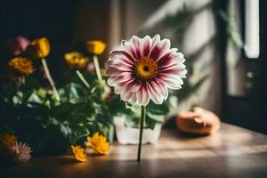 uma solteiro flor sentado em uma mesa dentro frente do uma janela. gerado por IA foto