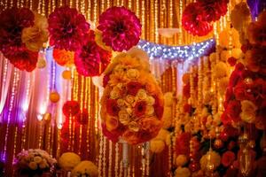 uma colorida Casamento decoração com flores e guirlandas. gerado por IA foto