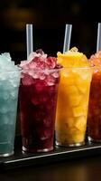 plástico copos aguarde congeladas fruta raspadinhas, alinhado dentro uma colorida, gelado linha vertical Móvel papel de parede ai gerado foto