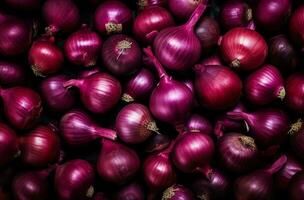 delicioso e saudável vermelho cebolas deitado em topo do cada de outros dentro uma grupo. ai gerado foto