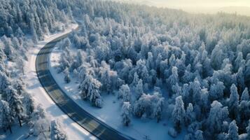 aéreo Visão do ventoso e cheio de curvas estrada dentro neve coberto floresta panorama. generativo ai foto