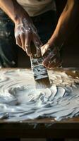 madeira pintura conceito masculino mão aplica-se branco pintar, capturando criativo processo de perto. vertical Móvel papel de parede ai gerado foto