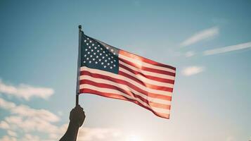 americano bandeira dentro mão em azul céu fundo. Unidos estados do América. ai gerado. foto