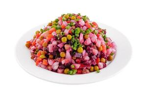 salada vinagrete com fervido legumes em prato foto