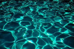 superfície da água da piscina azul foto