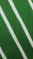 verde e branco listrado tecido textura fundo. ai gerado foto